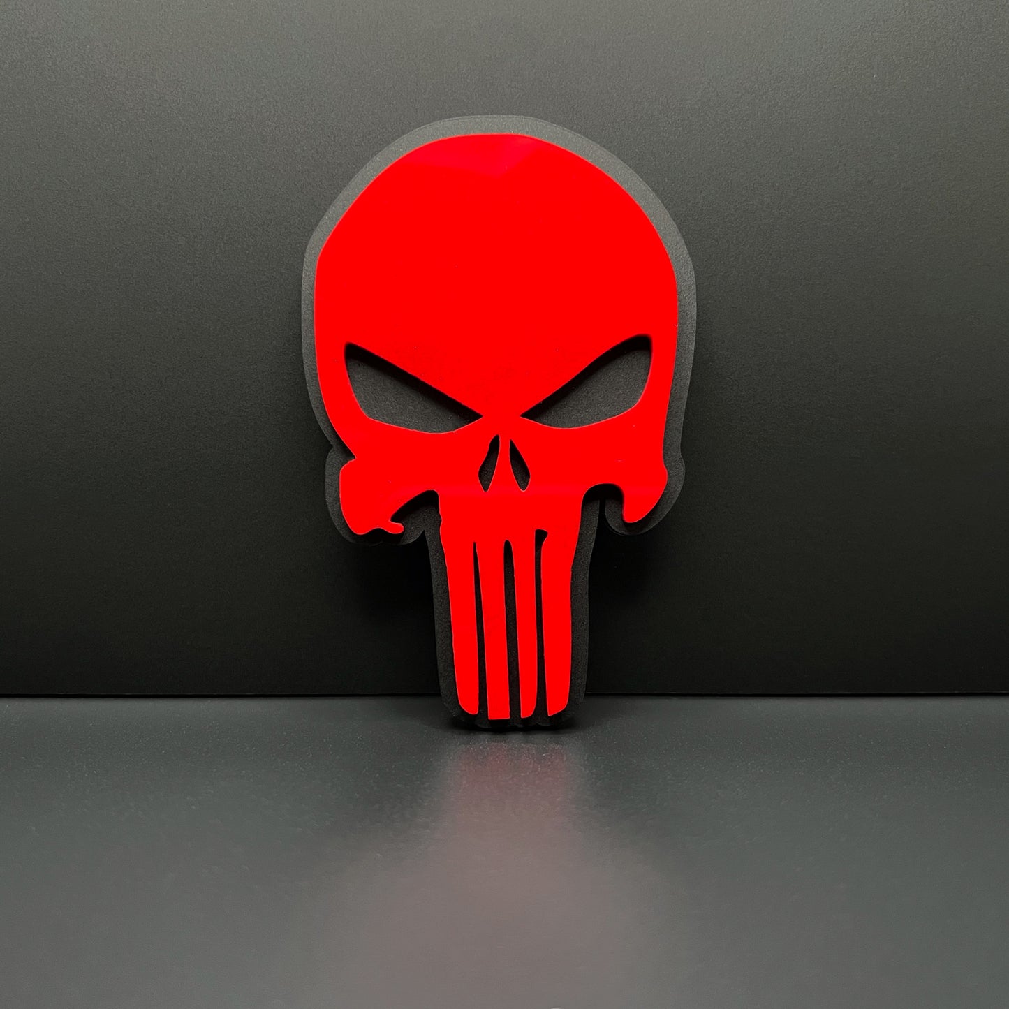 Black and Red PUNISHER Head Emblem by FMSgear with bold red skull design on black background