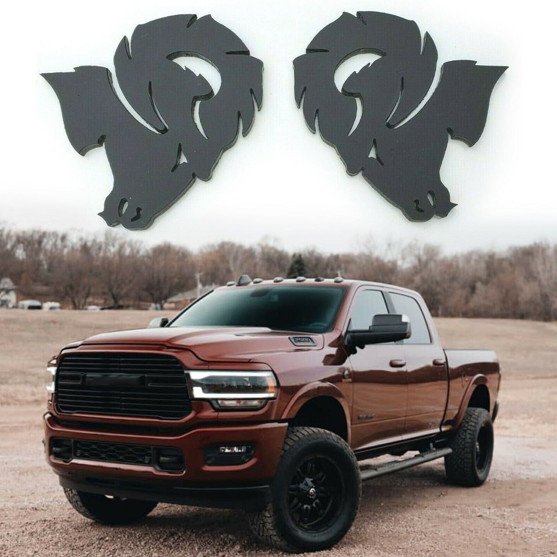 Custom Dodge Ram Hellcat Emblem in black shown above a lifted brown Dodge Ram truck in a rural setting