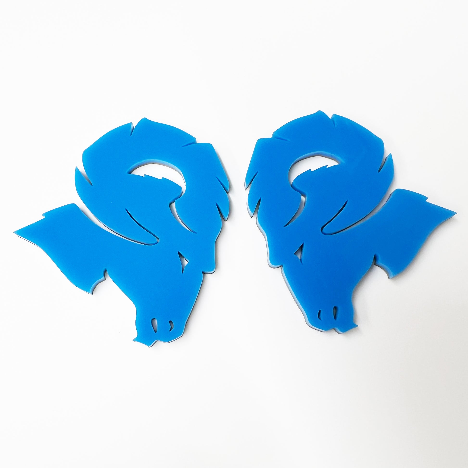 FMSgear Custom Dodge Ram Hellcat Emblem pair in vibrant blue color for vehicle customization