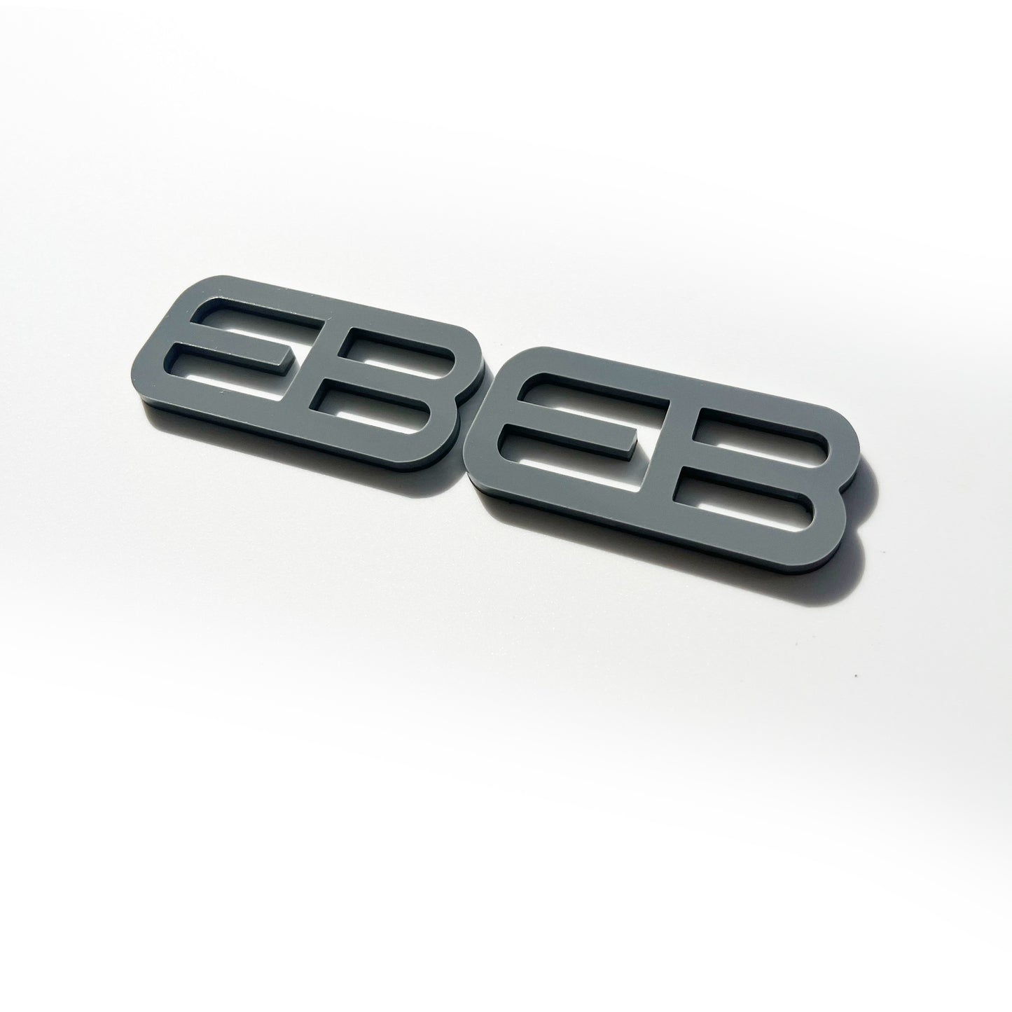 FMSgear black custom emblems Ford Mustang f-150 with modern design on white background