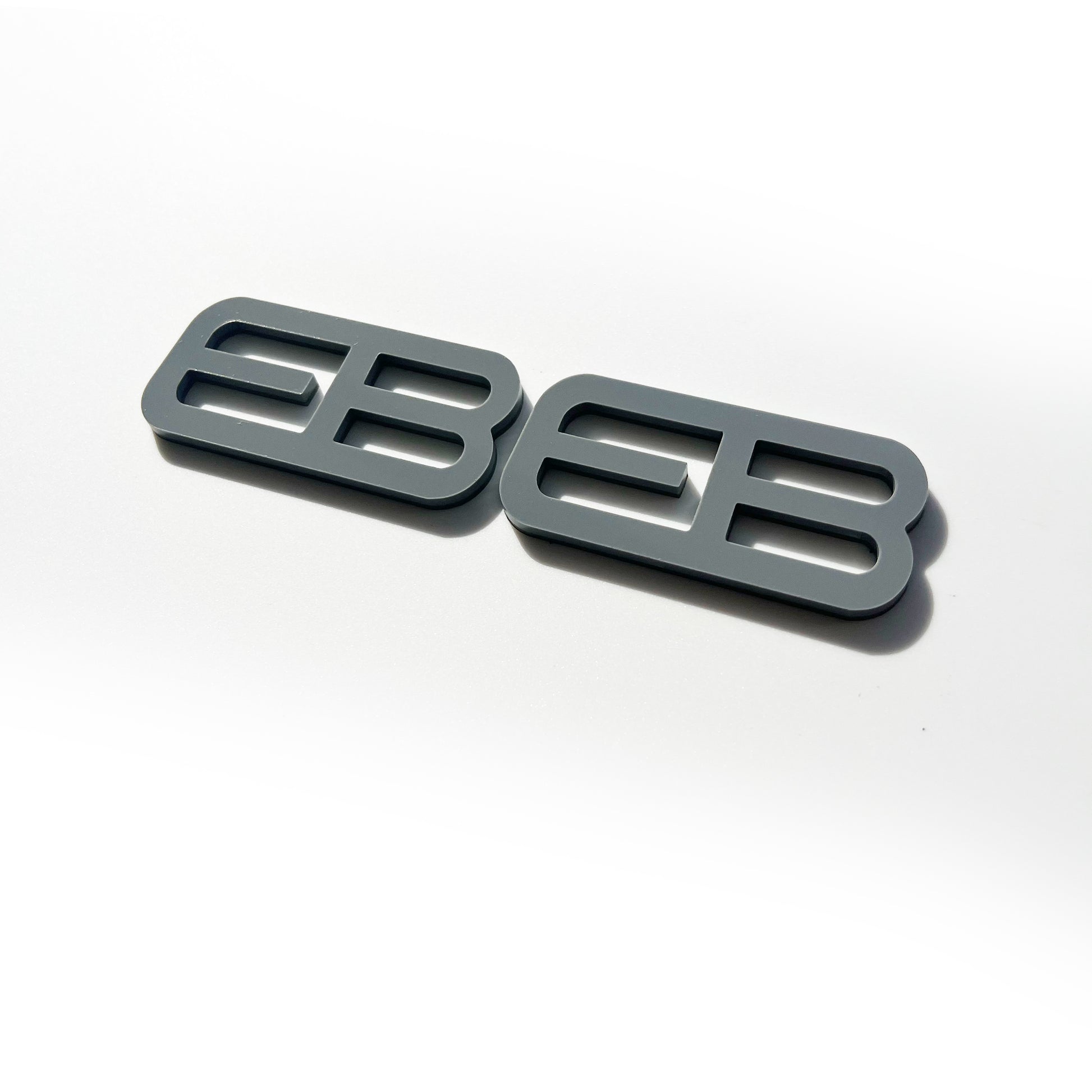 FMSgear black custom emblems Ford Mustang f-150 with modern design on white background