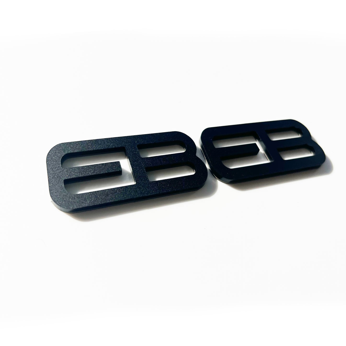 FMSgear black custom emblems Ford Mustang f-150 with sleek modern design on white background