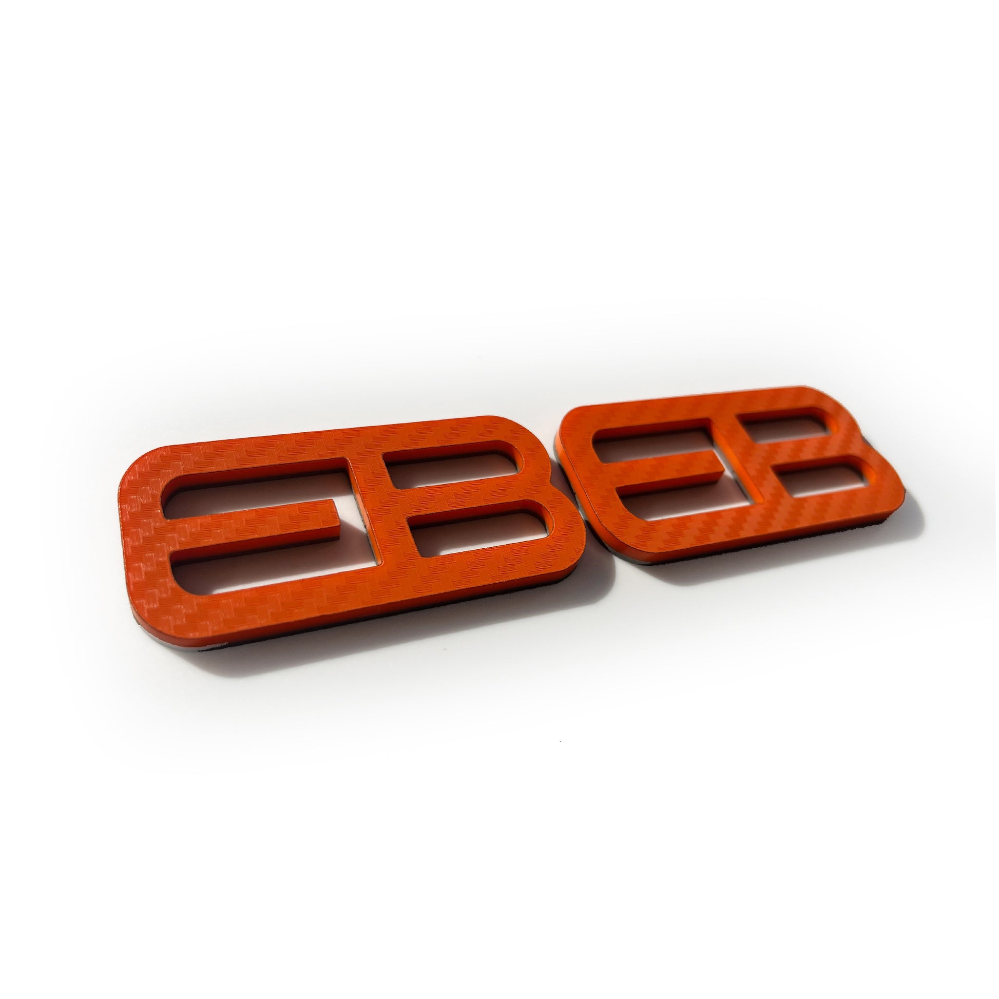 FMSgear custom emblems Ford Mustang f-150 in orange carbon fiber style with bold design