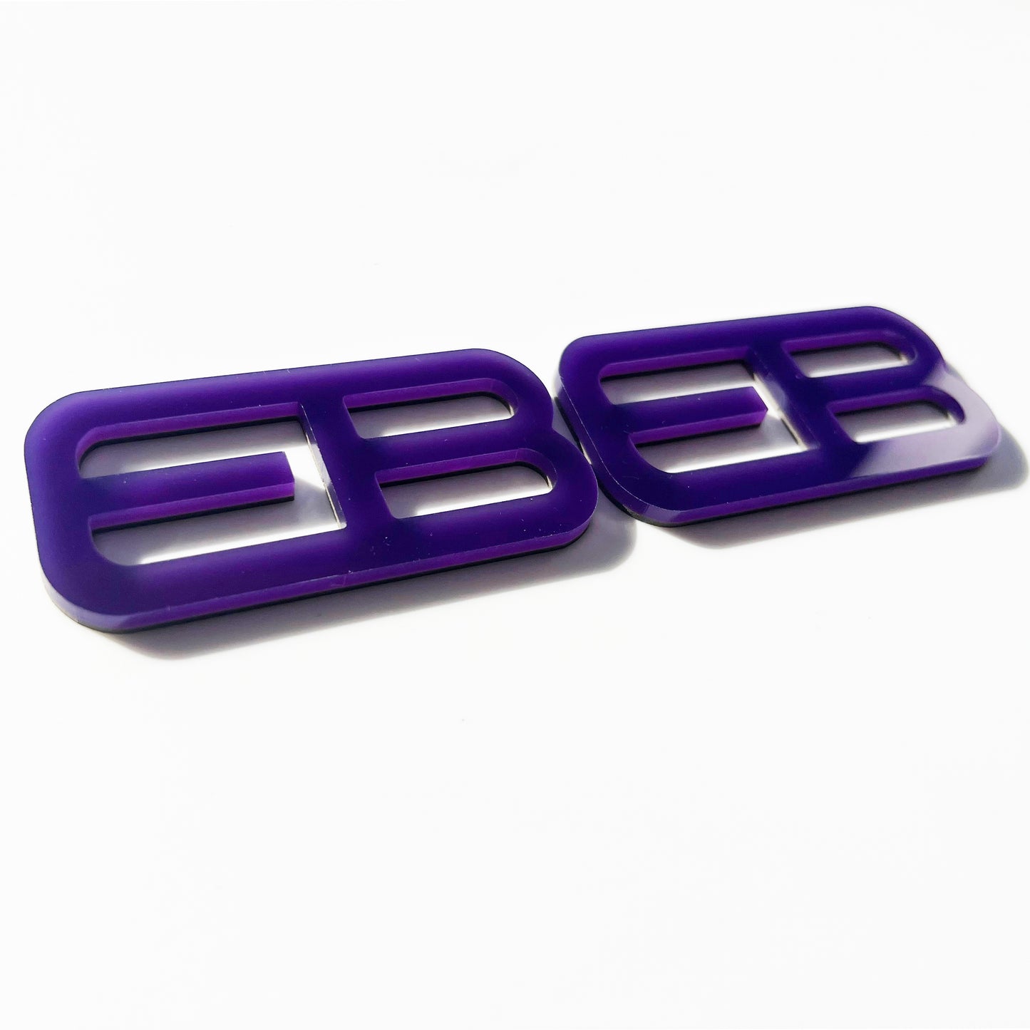 FMSgear purple custom emblems Ford Mustang f-150 with bold cutout design on white background