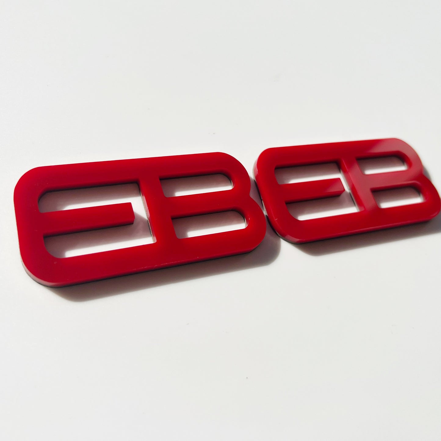 FMSgear red plastic custom emblems Ford Mustang f-150 with modern block lettering design