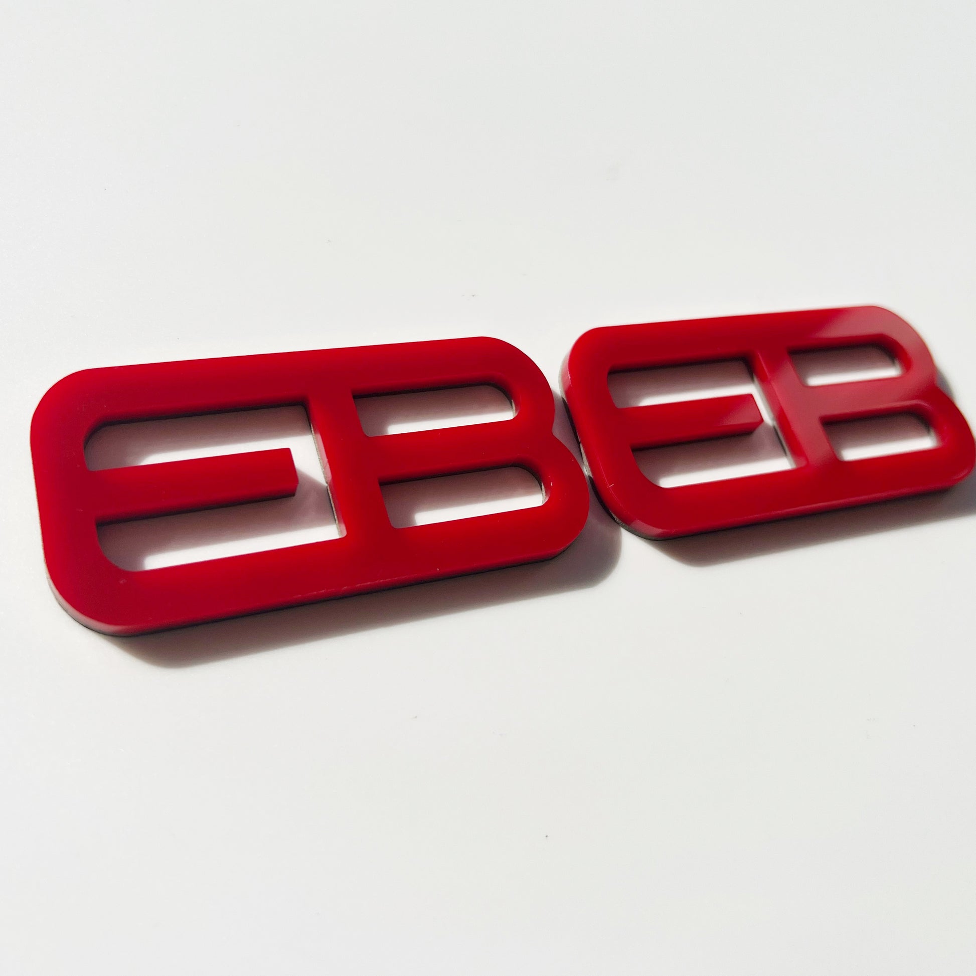 FMSgear red plastic custom emblems Ford Mustang f-150 with modern block lettering design