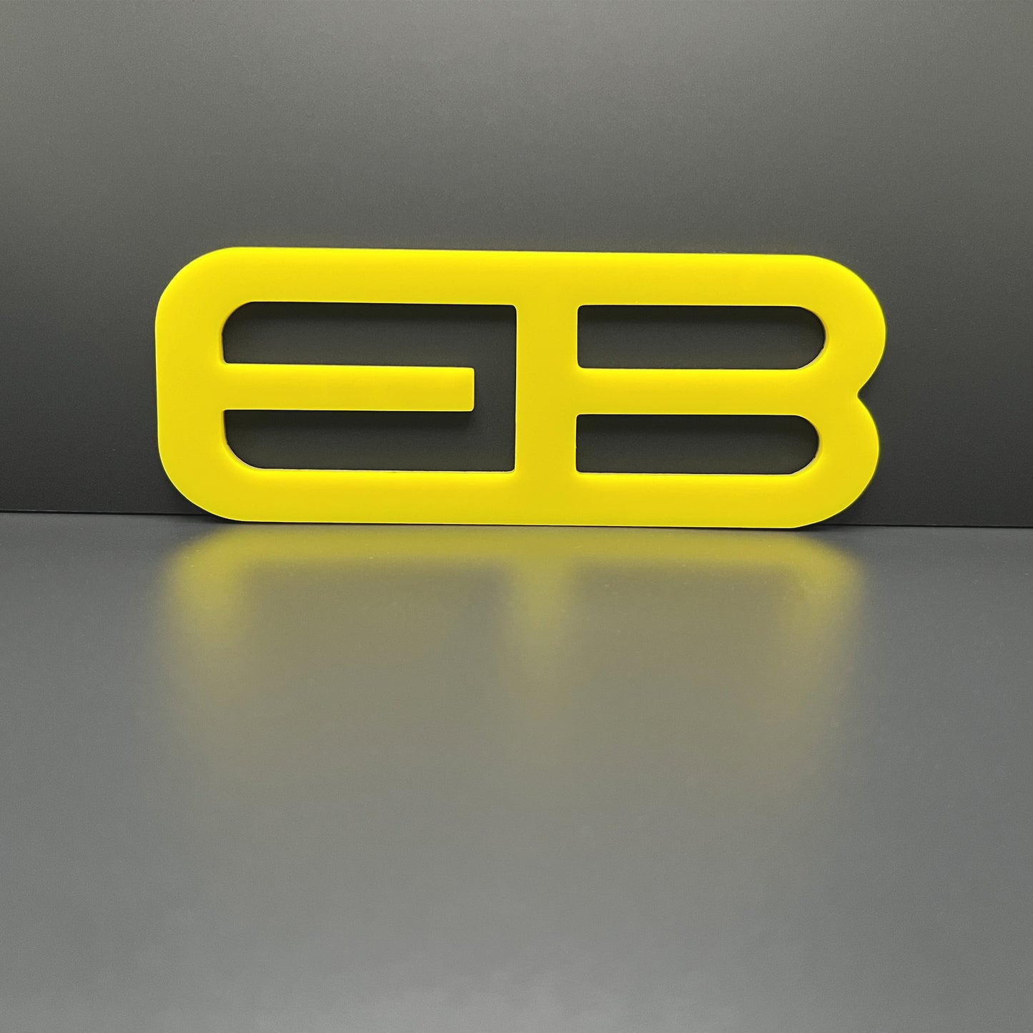 FMSgear yellow custom rear trunk logo for Mustang 2015-2025 emblem on gray background
