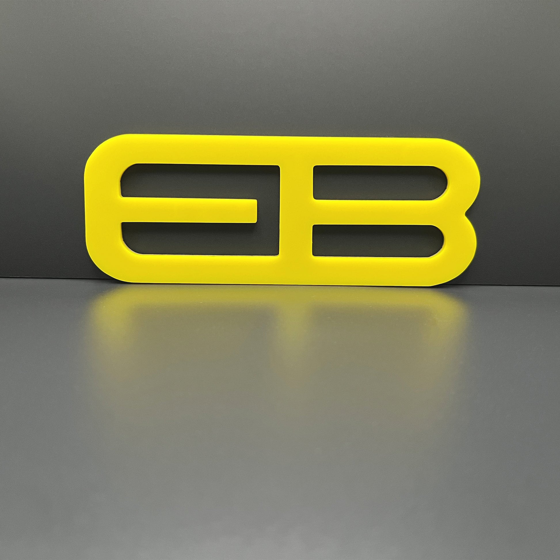 FMSgear yellow custom rear trunk logo for Mustang 2015-2025 emblem on gray background