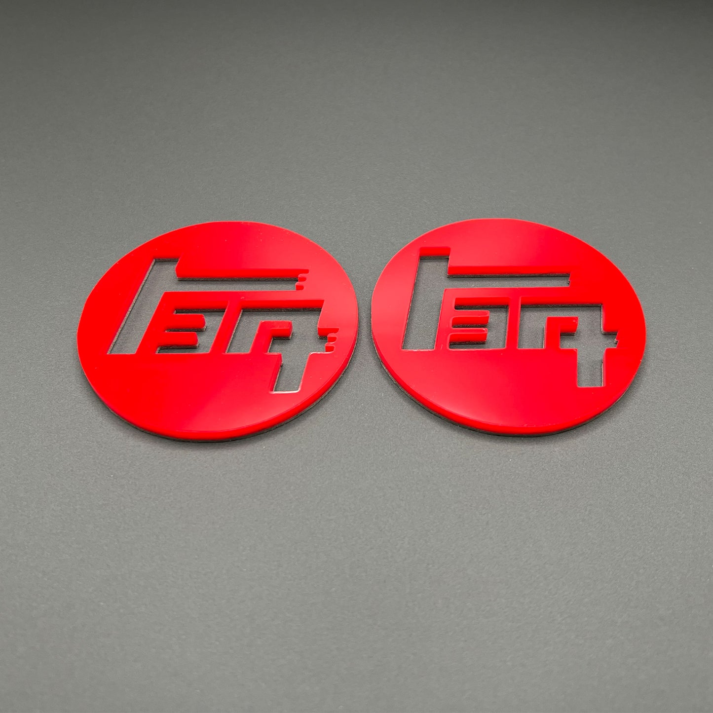 FMSgear custom Toyota TEQ emblem set in red round design with cutout lettering on gray background