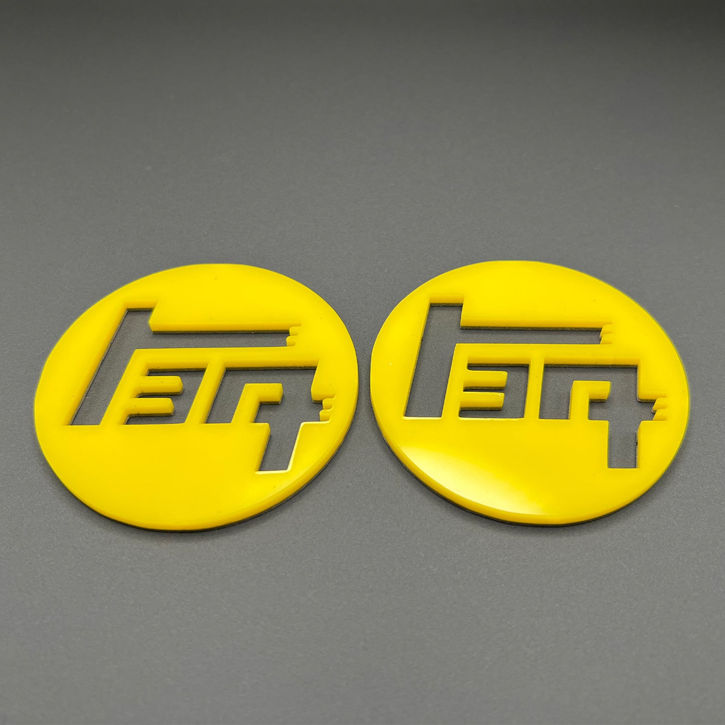 FMSgear custom Toyota TEQ emblem set in yellow round design on gray background