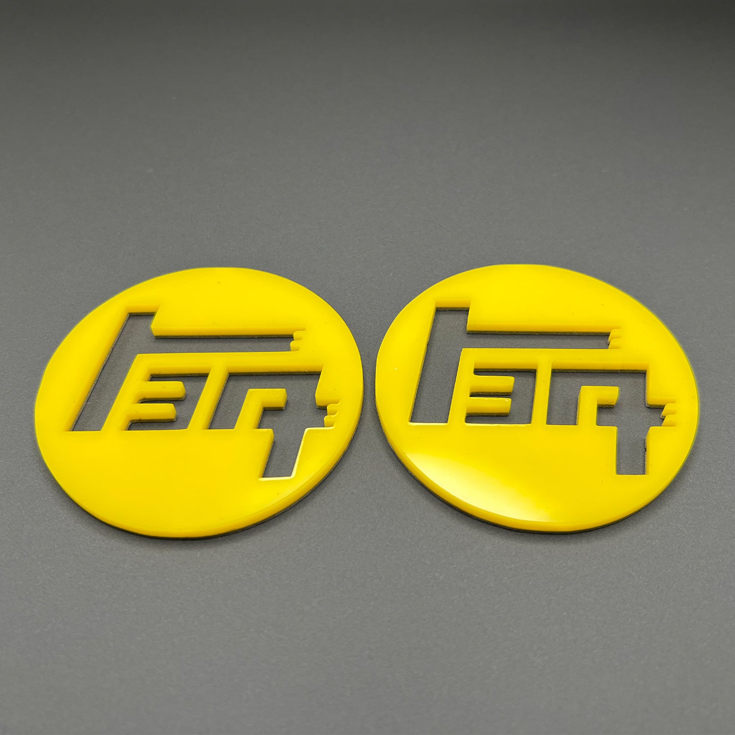 FMSgear custom Toyota TEQ emblem set in yellow round design on gray background