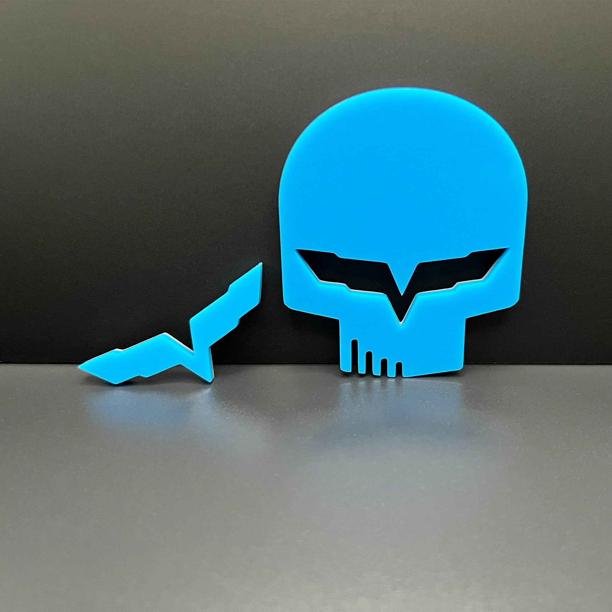 Jake skull badge for Corvette in bright blue by FMSgear with skull and wing emblems