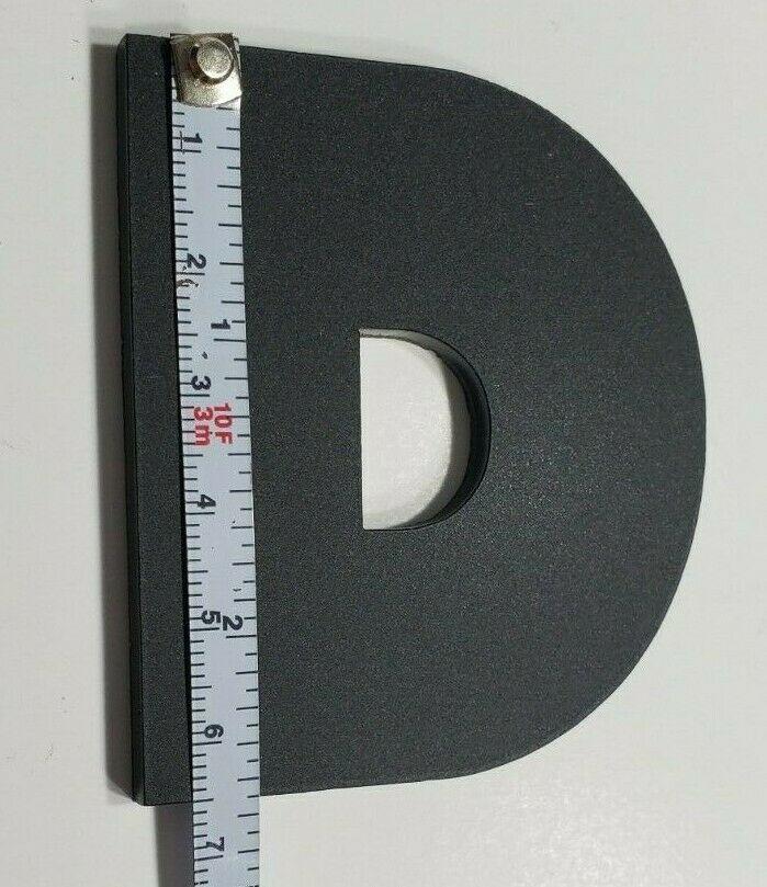 Custom diesel emblem Silverado letter D moulding and trim piece with measuring tape for size reference