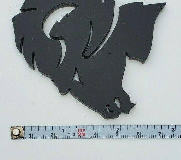 Custom Dodge Ram Hellcat Emblem in black metal with measuring tape showing size by FMSgear